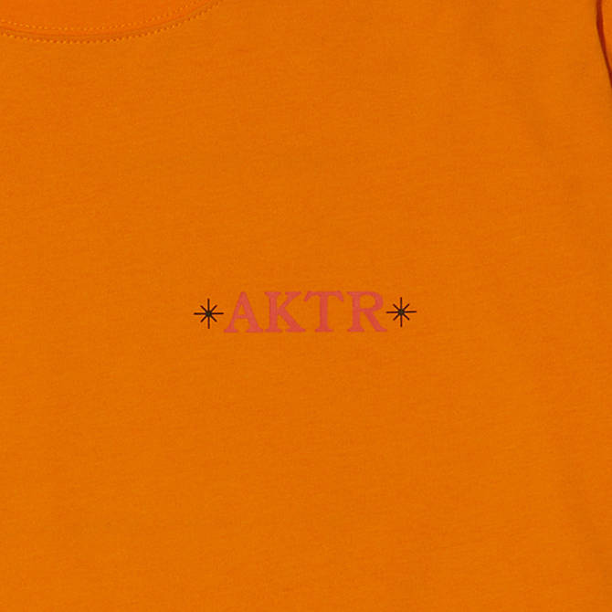 AKTR FLUCTUATION L/S TEE OR【122-104005】