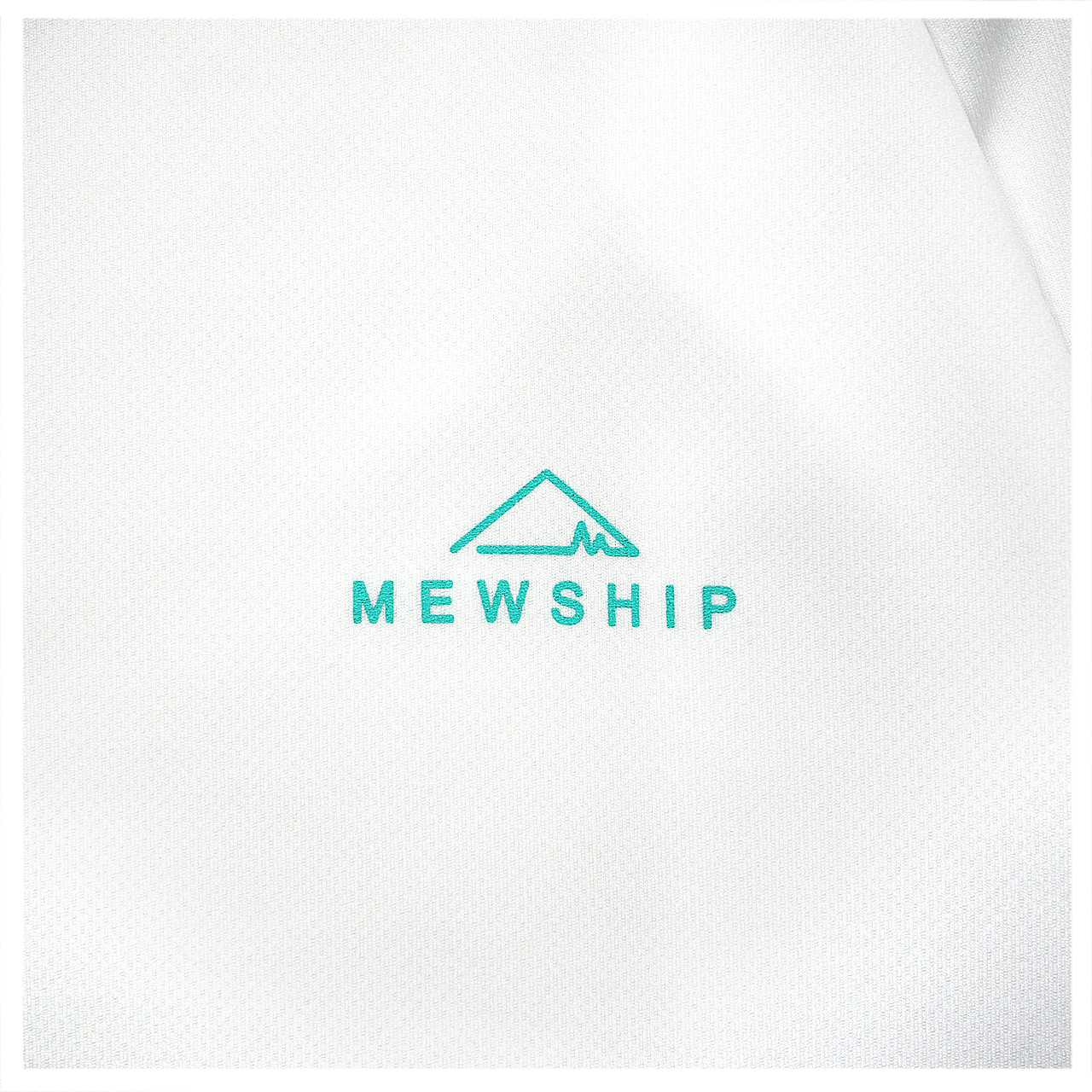 Mewship BASE LOGO L/S PL <White×B.Green>